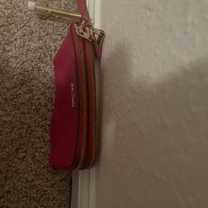 Pink coach wristlet